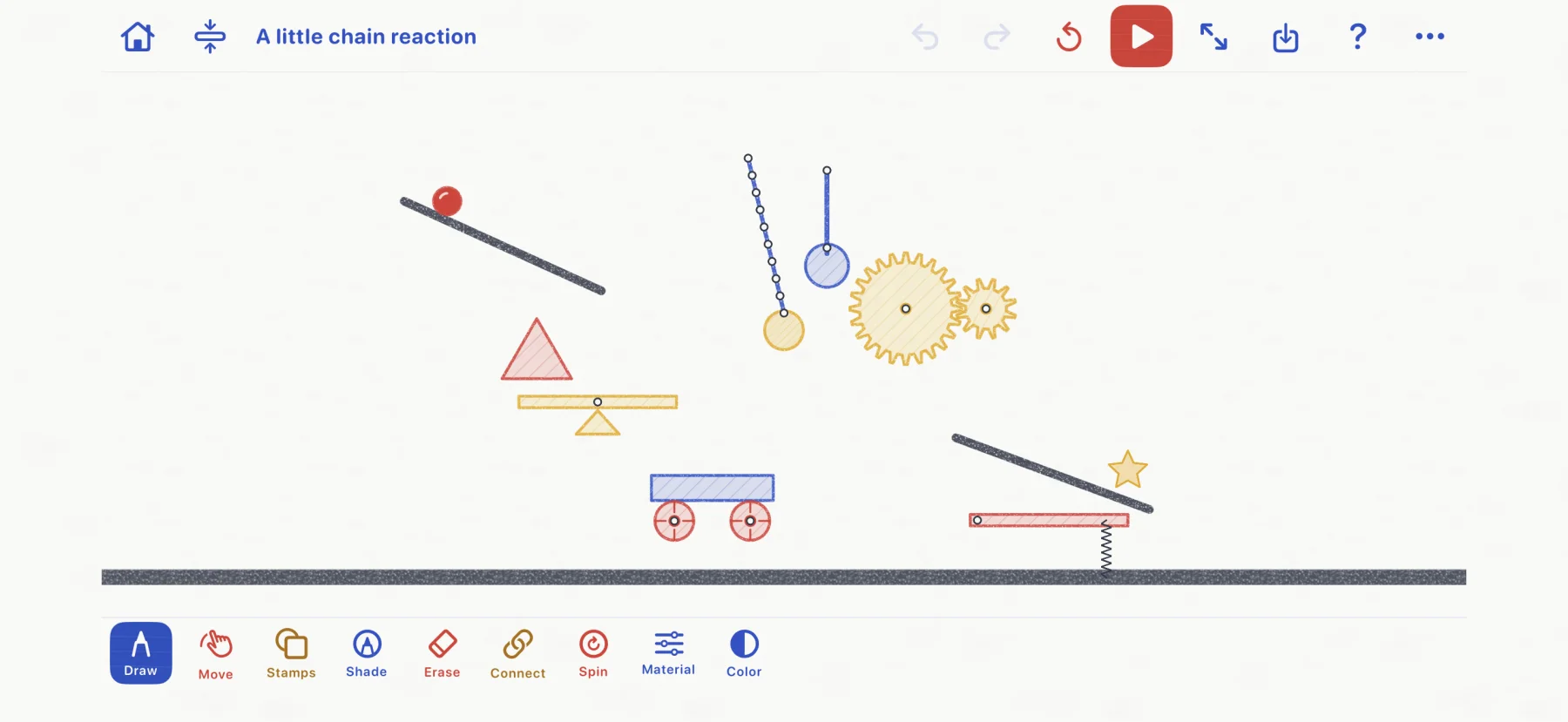 Actual Drawn to Physics workshop filled with gears, pendulums, ramps, a car, and a springboard